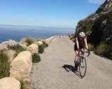 Mary-Beth Gardner tackles hills on her bicycle during a trip to Spain. 