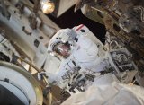 Flight Engineer Doug Wheelock worked outside the International Space Station in August 2010 to install a spare pump module. --NASA Image