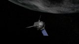 An artist's concept of NASA's OSIRIS-REx spacecraft preparing to take a sample from asteroid Bennu. Image: NASA.