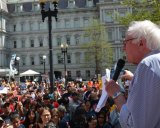 Sen. Bernie Sanders, I-Vt., speaks to a crowd in front of the United States Trade Representative's office in Washington, D.C. A presidential candidate, Sanders embraces Democratic socialism. Image: Sanders' Senate office. 