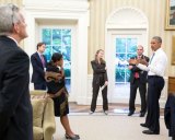 President Barack Obama talks with national security staff in the Oval Office after being notified of the nuclear agreement with Iran. Image: White House Photo by Pete Souza.