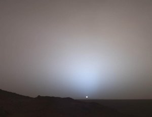 Mars rover photos land at space museum The Mars Rover Spirit took this view of a sunset over the rim of Gusev Crater, about 80 kilometers (50 miles) away. It looks much like a sunset on Earth—a reminder that other worlds can seem eerily familiar. --NASA image.