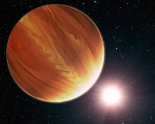 This is an illustration of the gas giant planet HD 209458b in the constellation Pegasus. Astronomers found much less water vapor in the hot world’s atmosphere than predicted. Image: NASA.