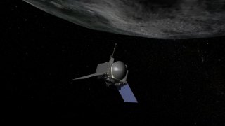 NASA In Brief -- Asteroid mission spacecraft gets go-ahead An artist's concept of NASA's OSIRIS-REx spacecraft preparing to take a sample from asteroid Bennu. Image: NASA.