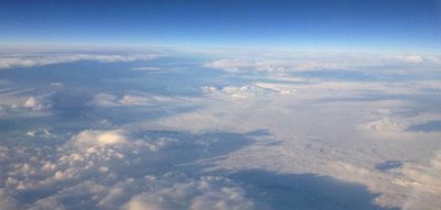 NASA In Brief -- Technology measures glaciers; telescopes spot distant galaxy This view of the Langjökull Ice Cap was captured from the cockpit of NASA's C-20A research aircraft. Image: NASA.