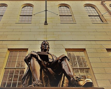 Statue of John Harvard at Harvard University. 