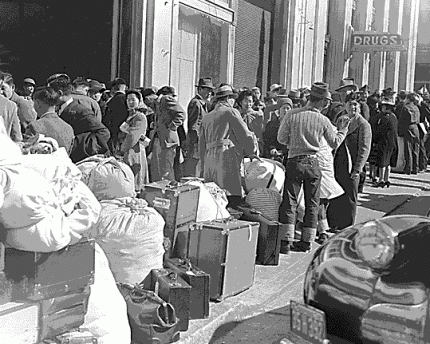 Internment of Japanese Americans still haunts In San Francisco, residents of Japanese ancestry await a bus (1942).
